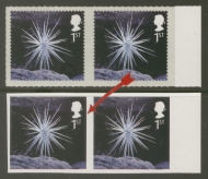 2003 1st Class Christmas stamp, where the background MATRIX is not removed from between the stamp, at a glance, looks Imperf. 